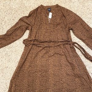 Brand new with tags leopard print, belted swing dress.